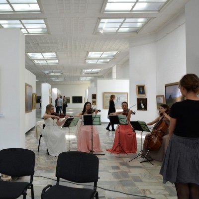 Students at the opening of Emil Childescu's exhibition