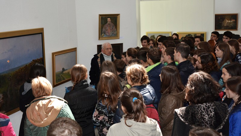 Students at the opening of Emil Childescu's exhibition