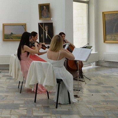 Students at the opening of Emil Childescu's exhibition